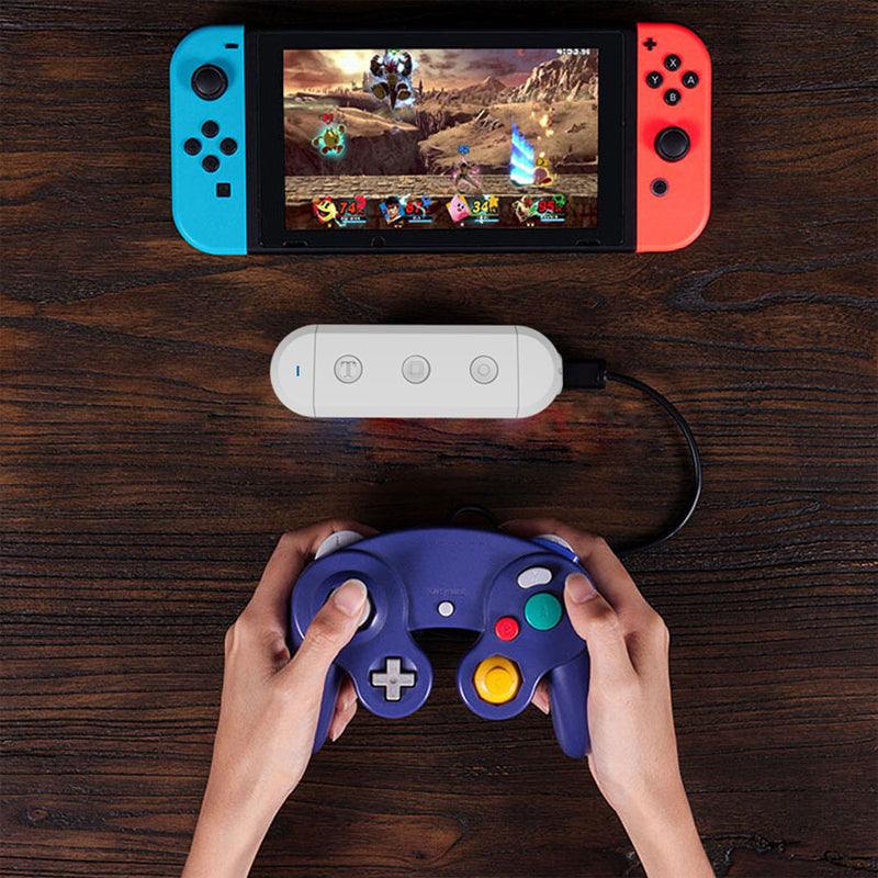 Wireless Controller Converter Adapter mit USB-Ladekabel für Nintendo Switch und PC, kompatibel mit Gamecube und Wii Controllern.